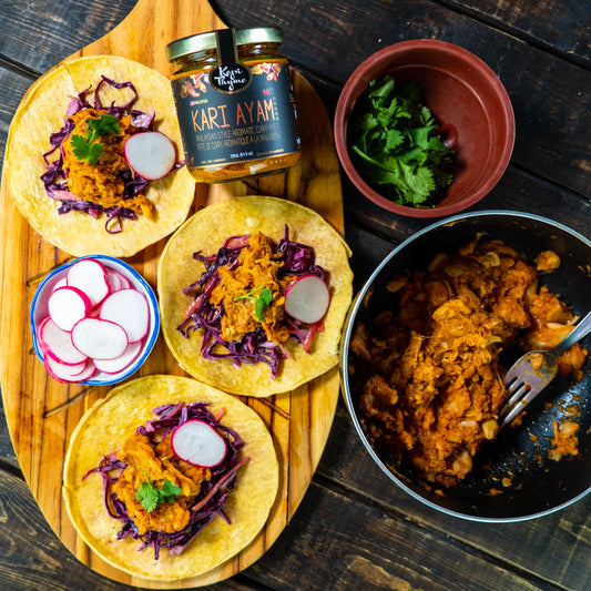 Make a twist on a pulled jackfruit taco by adding a touch of Kopi Thyme Kari Ayam to bring out some curry goodness.